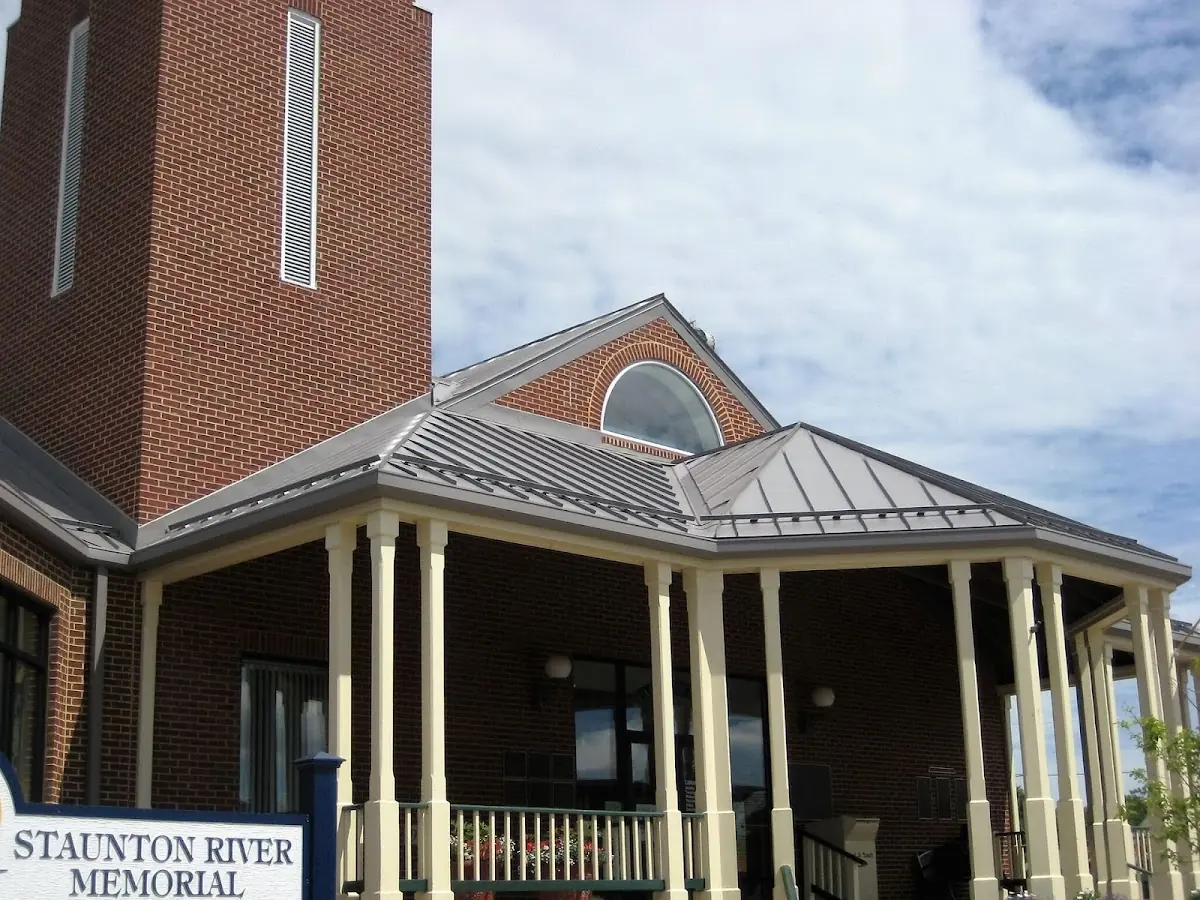 Skilled roofing craftsmen working on a residential roof in Mount Pleasant